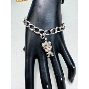 Vintage Monet Bracelet Silvertone Red Rhinestone Eye Lion Charm Brushed Finish